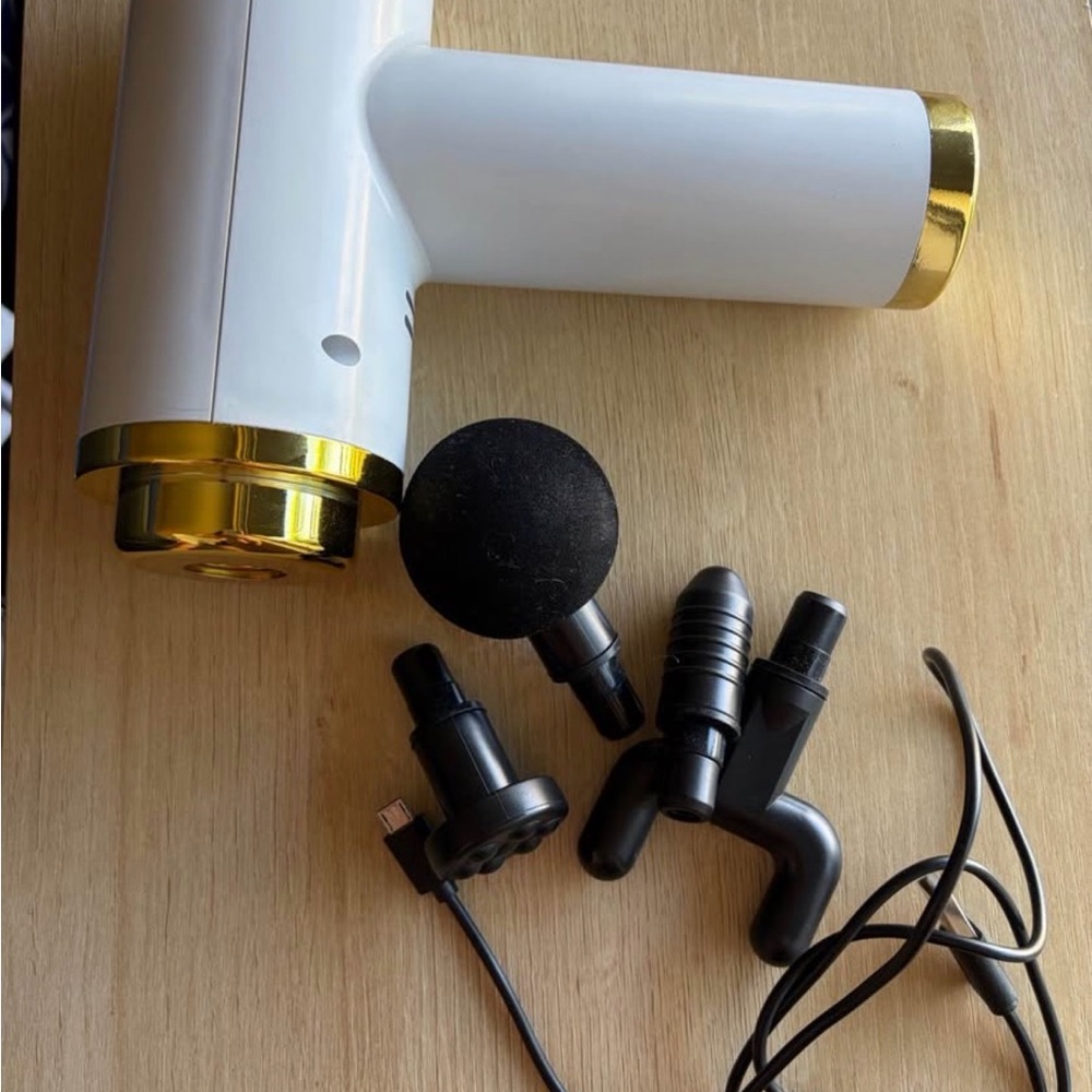 White and Gold Massage Gun with Attachments